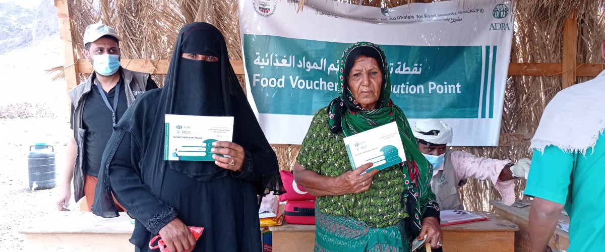 Elder Beneficiary Receiving Food Voucher- EALAAF II- ADRA Yemen.jpg