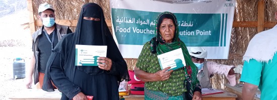 Elder Beneficiary Receiving Food Voucher- EALAAF II- ADRA Yemen.jpg